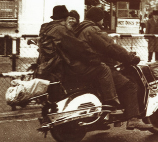 mod with hat on scooter.jpg